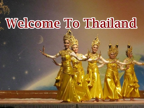 Traditional Thai dancers welcoming tourists to Thailand with a dance.