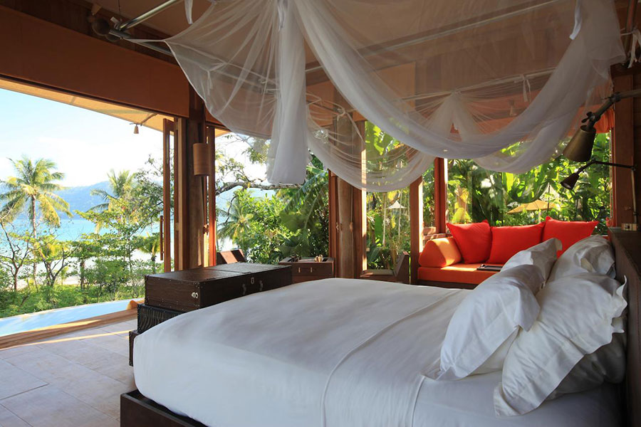 A luxury Thai hotel/resort showing beach view.