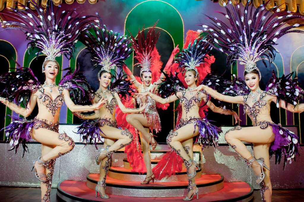 A Thai cabaret show featuring Thai ladyboys performing and dancing